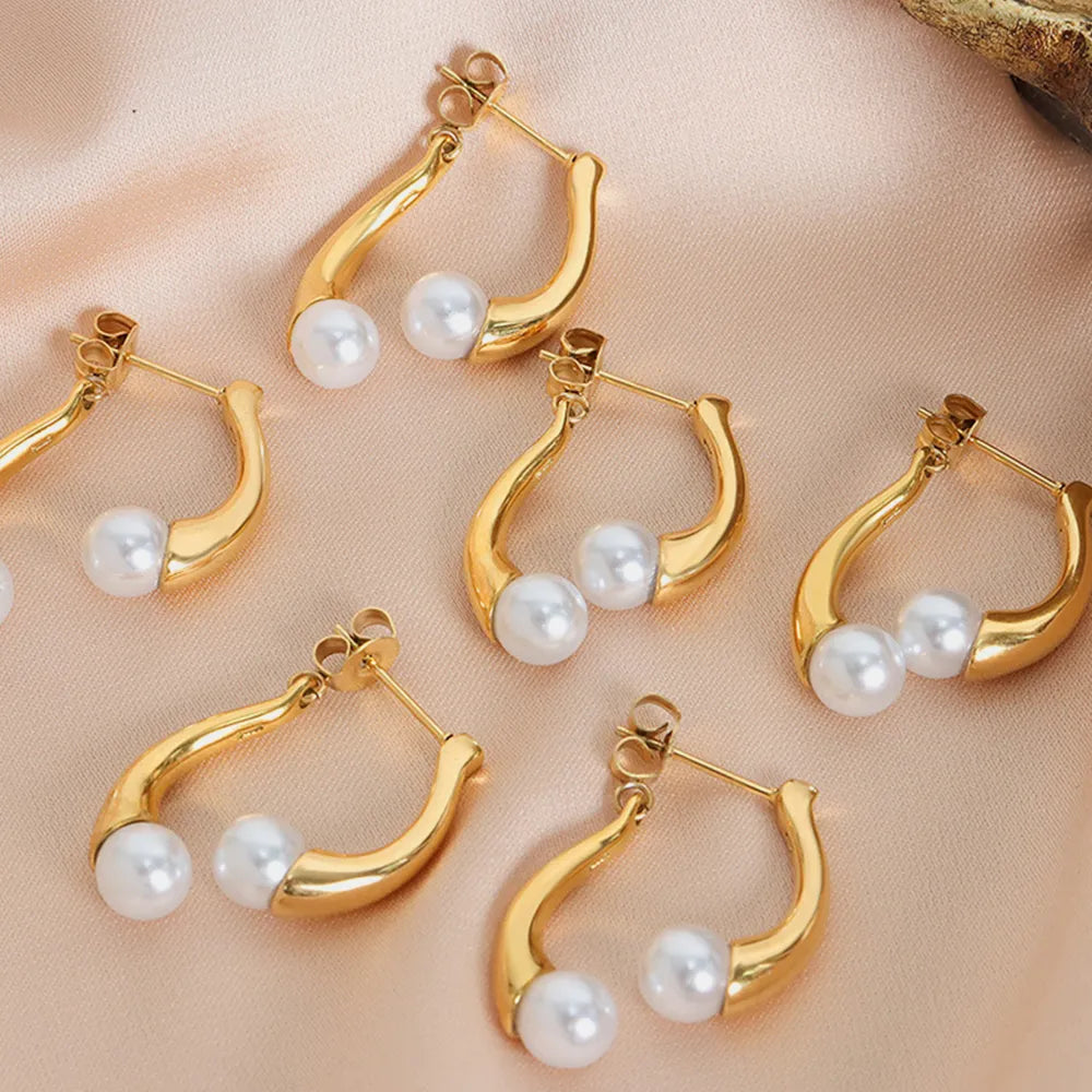 Elegant split design with high gloss pearl inlay simple titanium steel gold-plated earrings