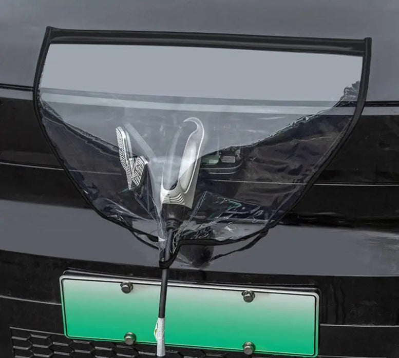 Car grill with a transparent cover and visible logo on a vehicle