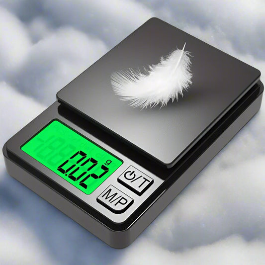 Digital pocket scale with a feather on top, displaying weight measurement.