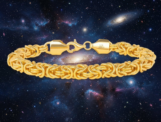 Gold bracelet on a white background with 'Jewelry' brand name.