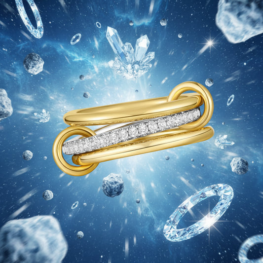 Gold ring with diamond accents on a white background