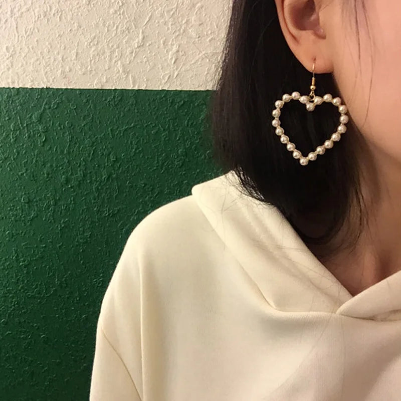HeartBeam Kiss Dangle — Golden Love Earrings for Every Outfit, Every Season
