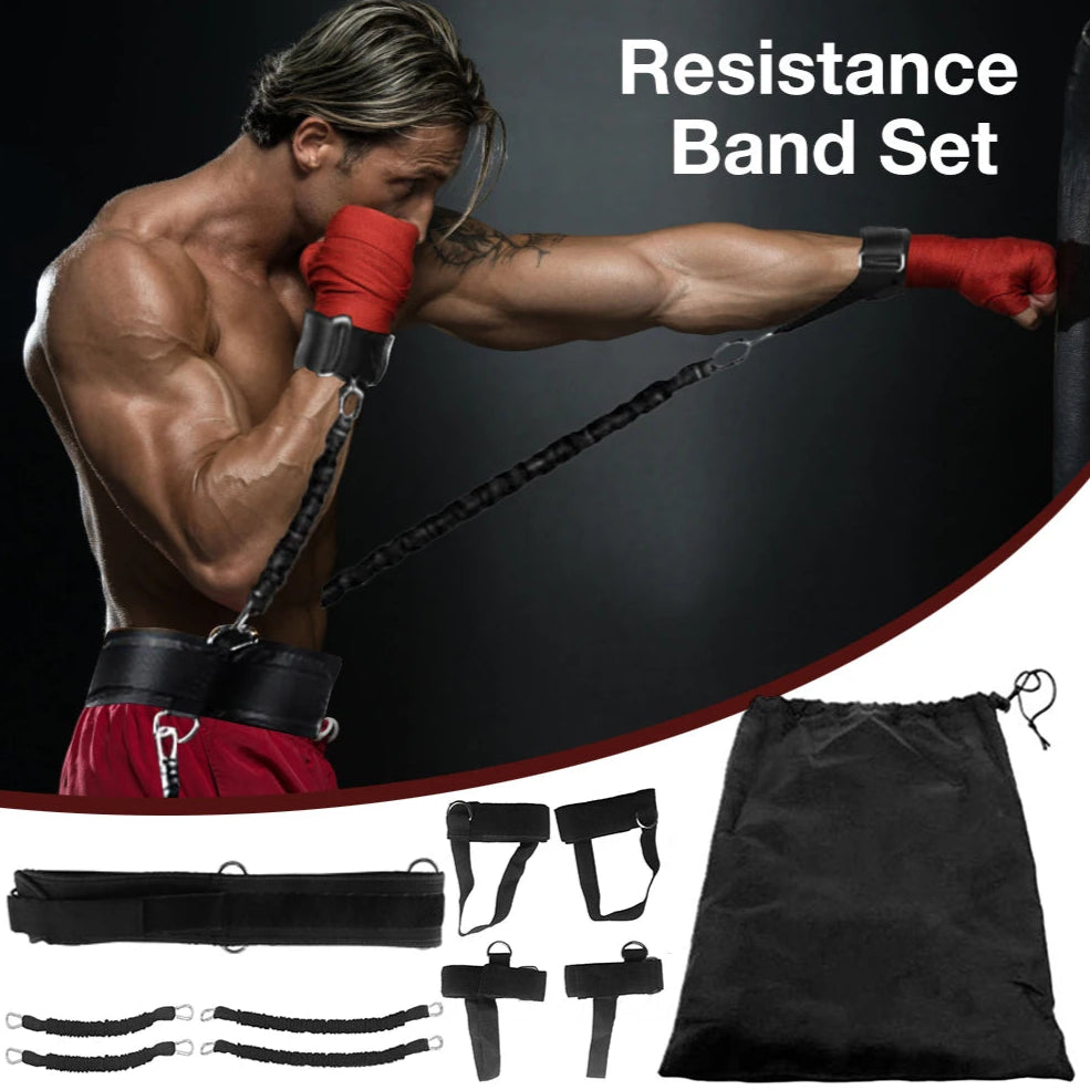 Man exercising with resistance bands and accessories on a black background