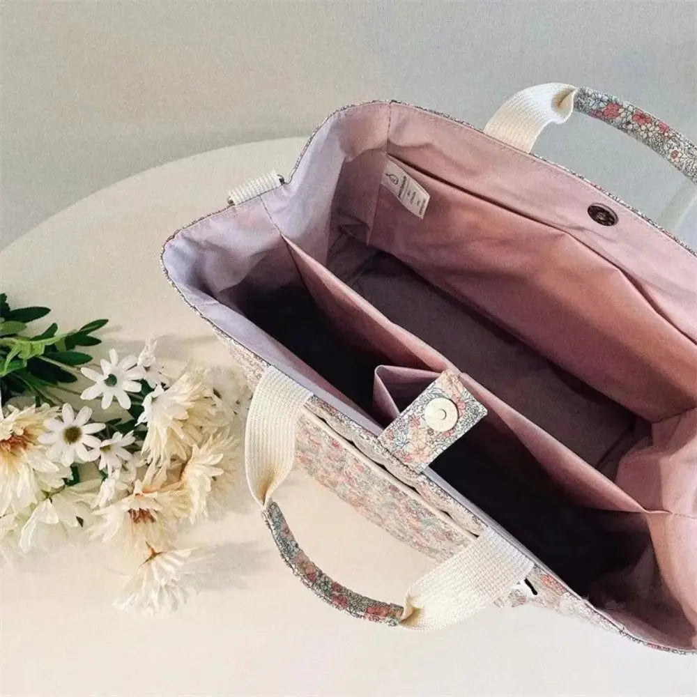 BloomCarry Luxe — Floral Cotton Mummy Bag for Modern Moms