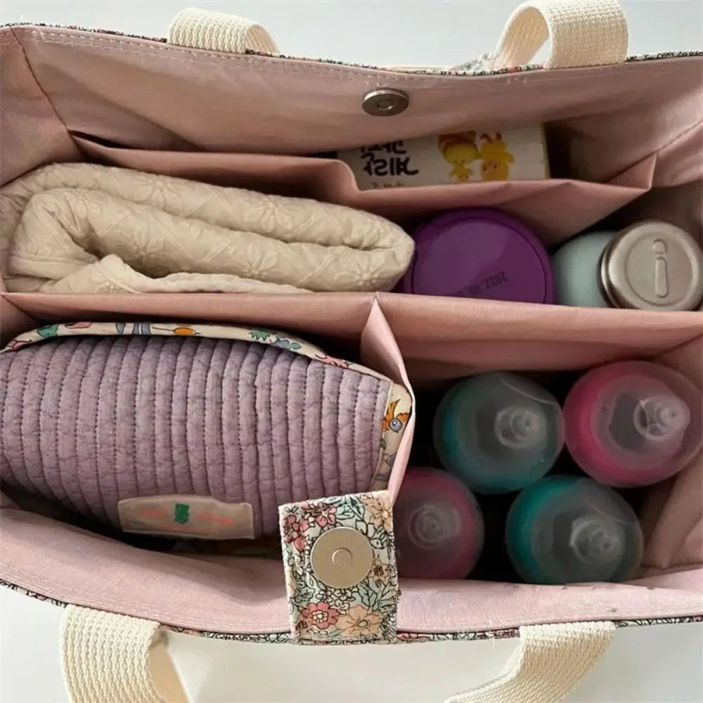 BloomCarry Luxe — Floral Cotton Mummy Bag for Modern Moms