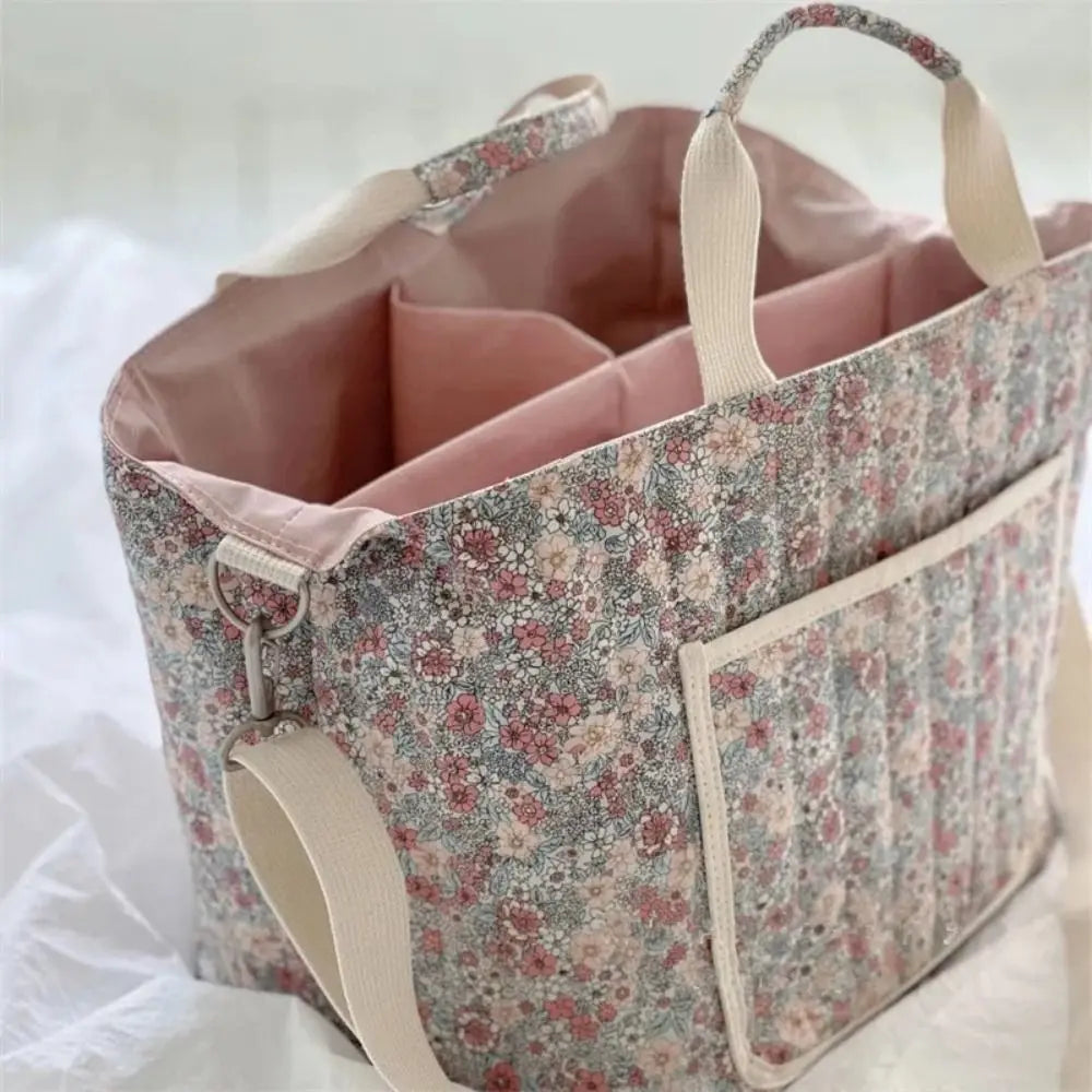 BloomCarry Luxe — Floral Cotton Mummy Bag for Modern Moms
