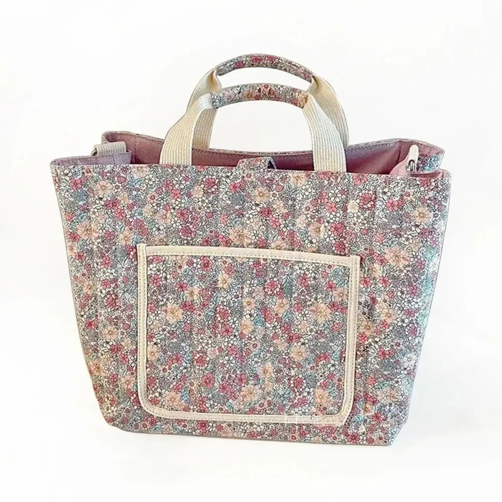 BloomCarry Luxe — Floral Cotton Mummy Bag for Modern Moms