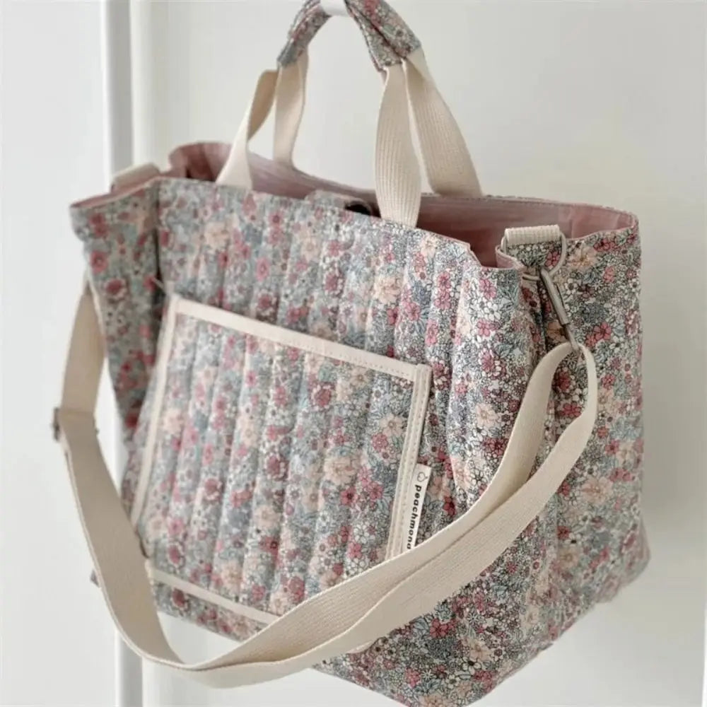 BloomCarry Luxe — Floral Cotton Mummy Bag for Modern Moms