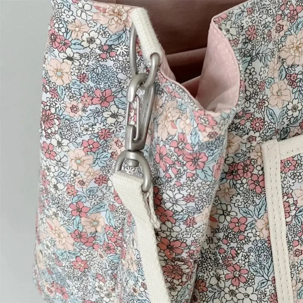 BloomCarry Luxe — Floral Cotton Mummy Bag for Modern Moms