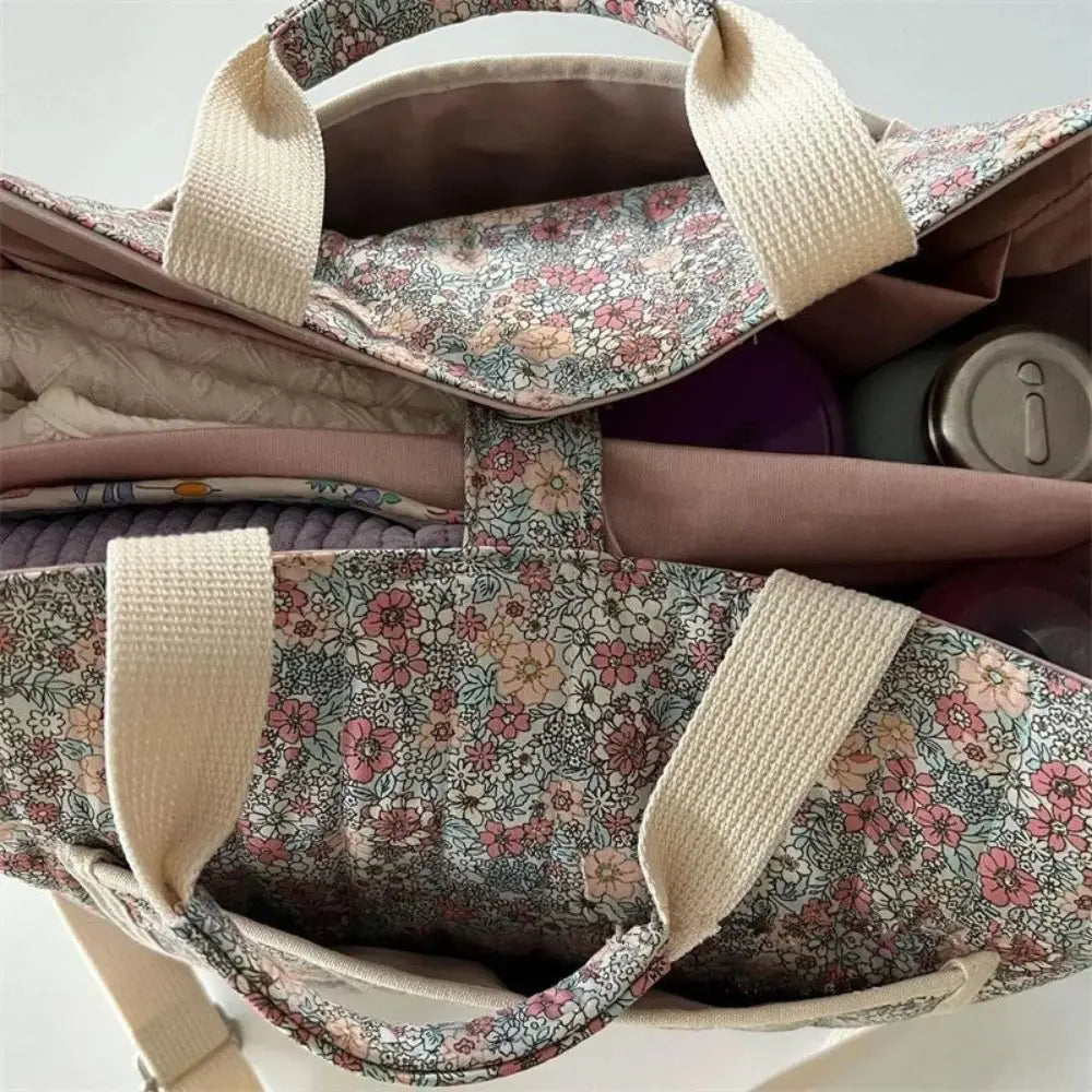 BloomCarry Luxe — Floral Cotton Mummy Bag for Modern Moms