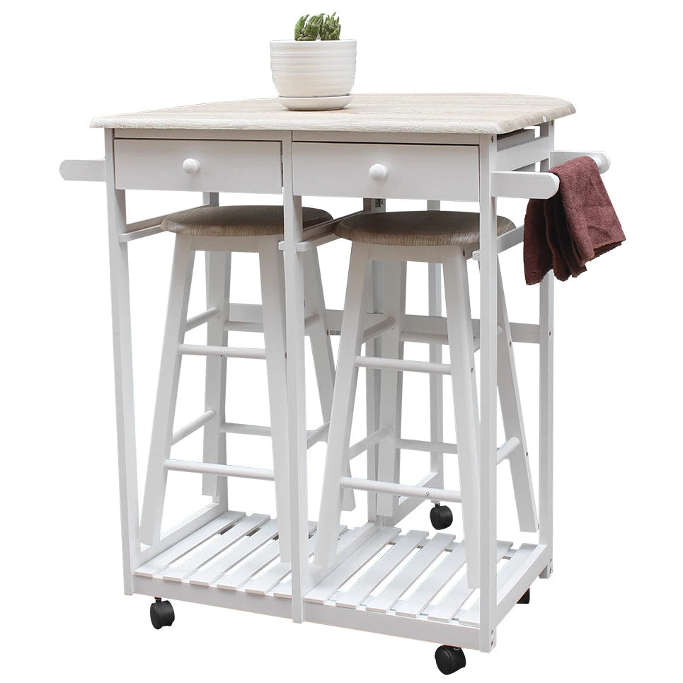 White kitchen island with stools and a plant on a white background