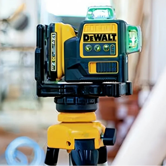Yellow and black Dewalt laser level on a blurred background